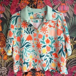 Nike Polo with Pastel Floral Design